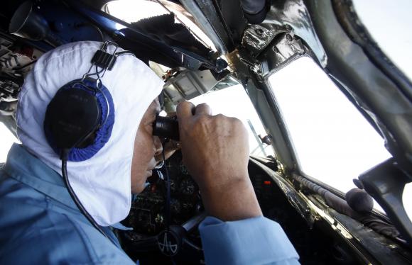 Deputy Commander of Vietnam 918 Air Brigade, Senior Lieutenant Thuc looks for missing Malaysia Airlines flight MH370, that disappeared, off Con Dao island